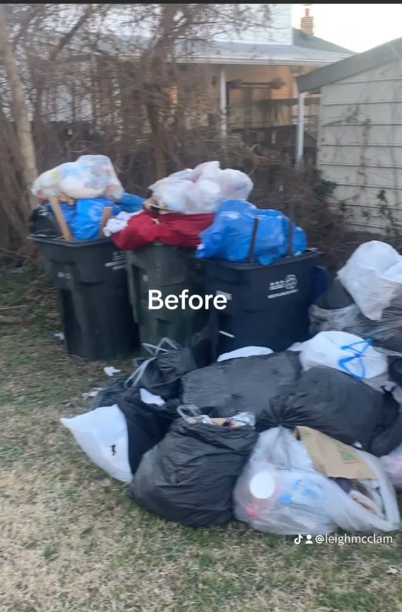 Back garden piled with black rubbish bags and overflowing bins before a Rich Brothers clearance